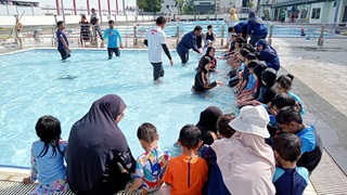 Participants of the Green Jeans Project learning how to sew